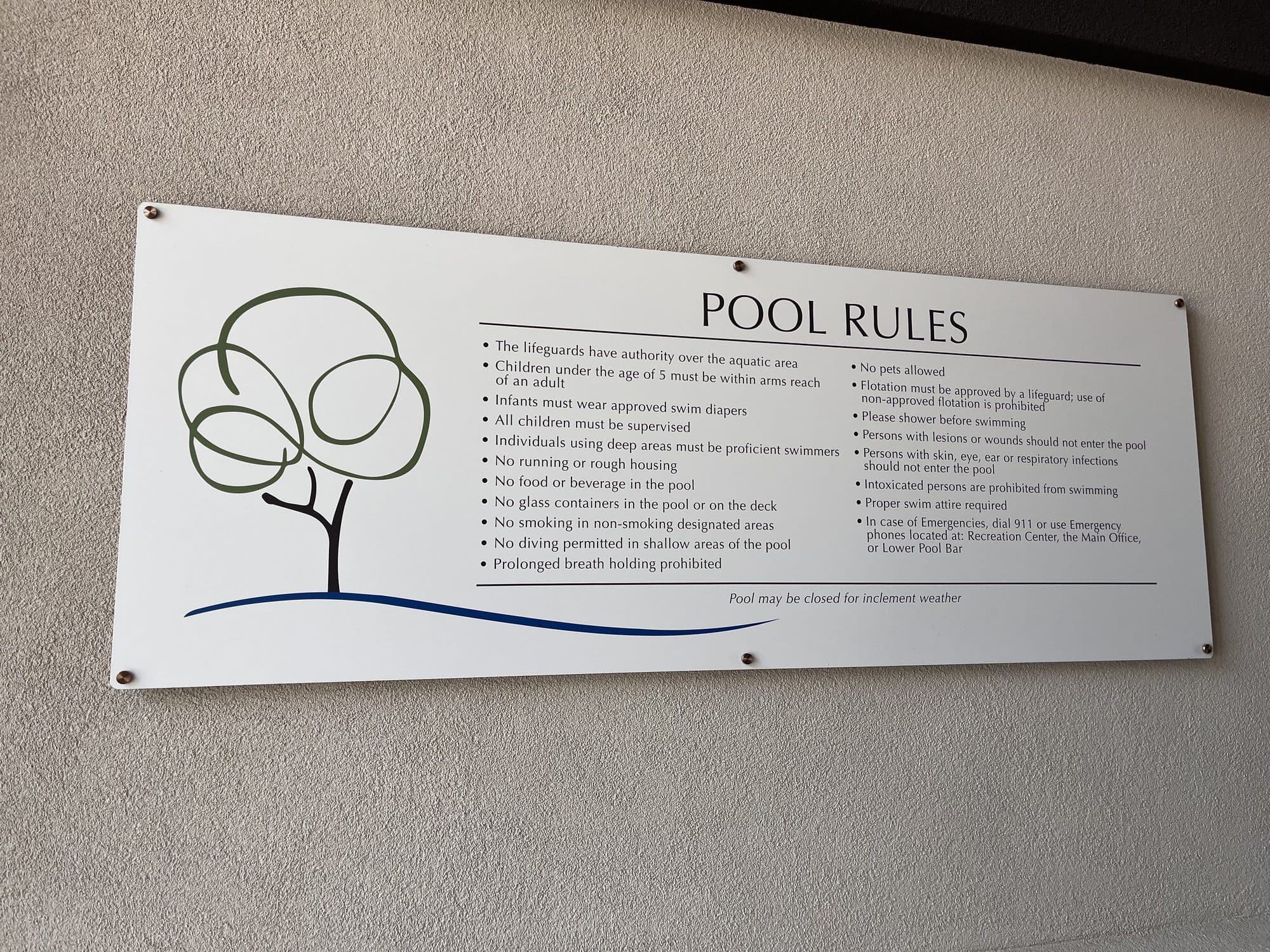 Pool Rules wall sign with the Lake Club tree mark