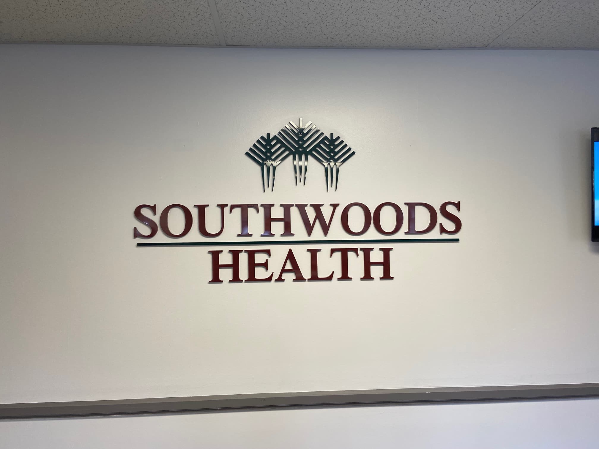 Healthridge Campus lobby with installed dimensional acrylic logo