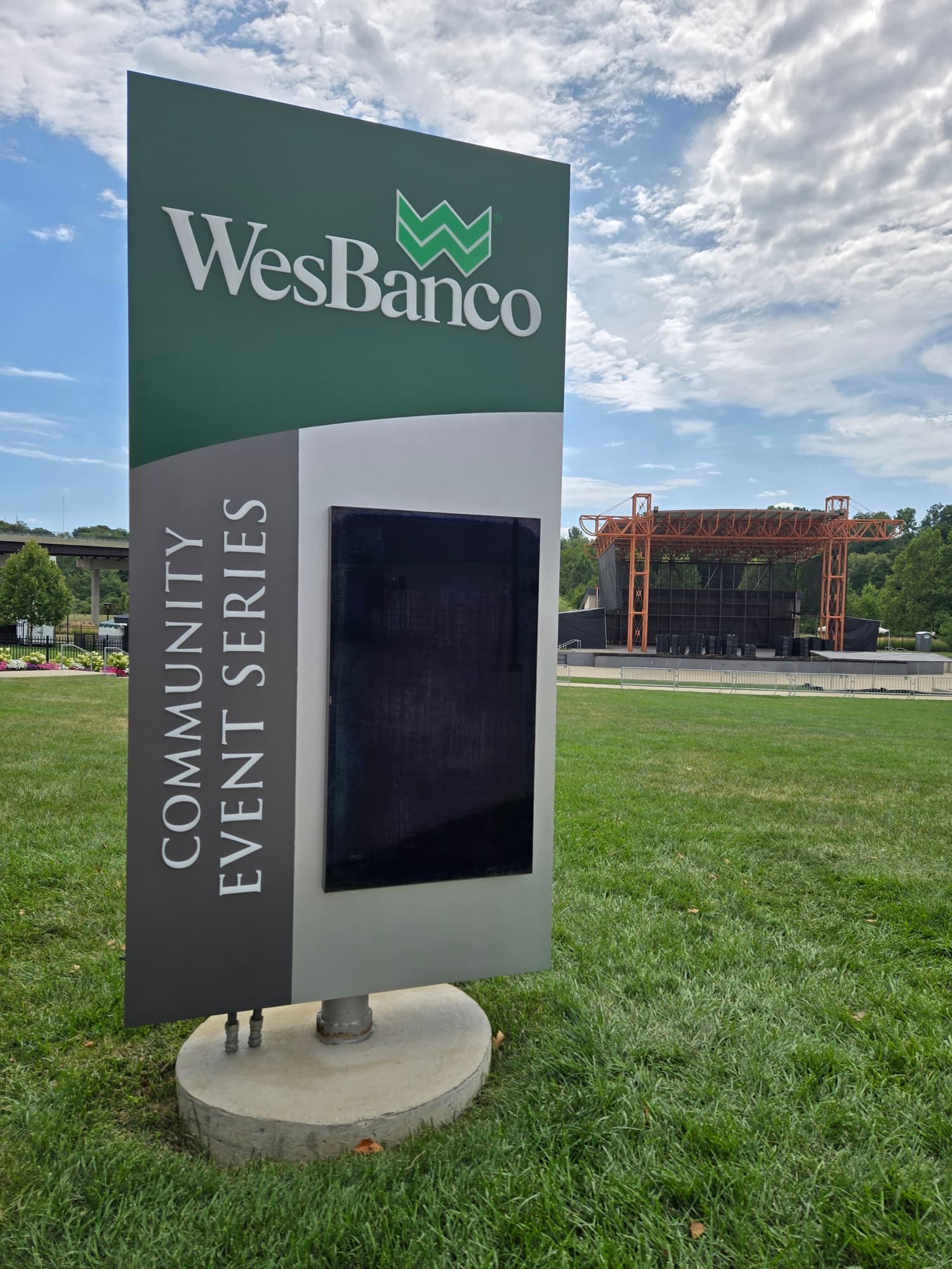 WesBanco Community Event Series sponsor cabinet at the amphitheatre with the stage in the background